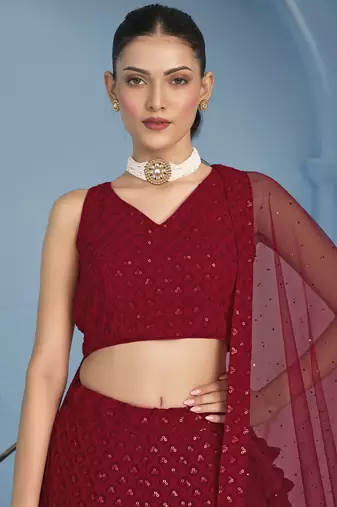 red colored sequins and thread embroidered georgette lehenga dress