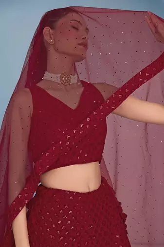 red colored sequins and thread embroidered georgette lehenga dress