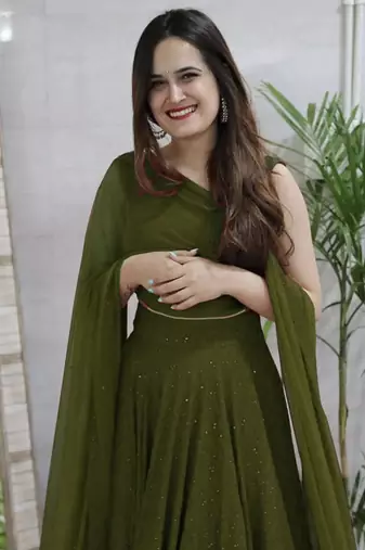fabulous Mahendi Green sequins and thread embroidered georgette reception indian wedding mahendi lehenga choli dress