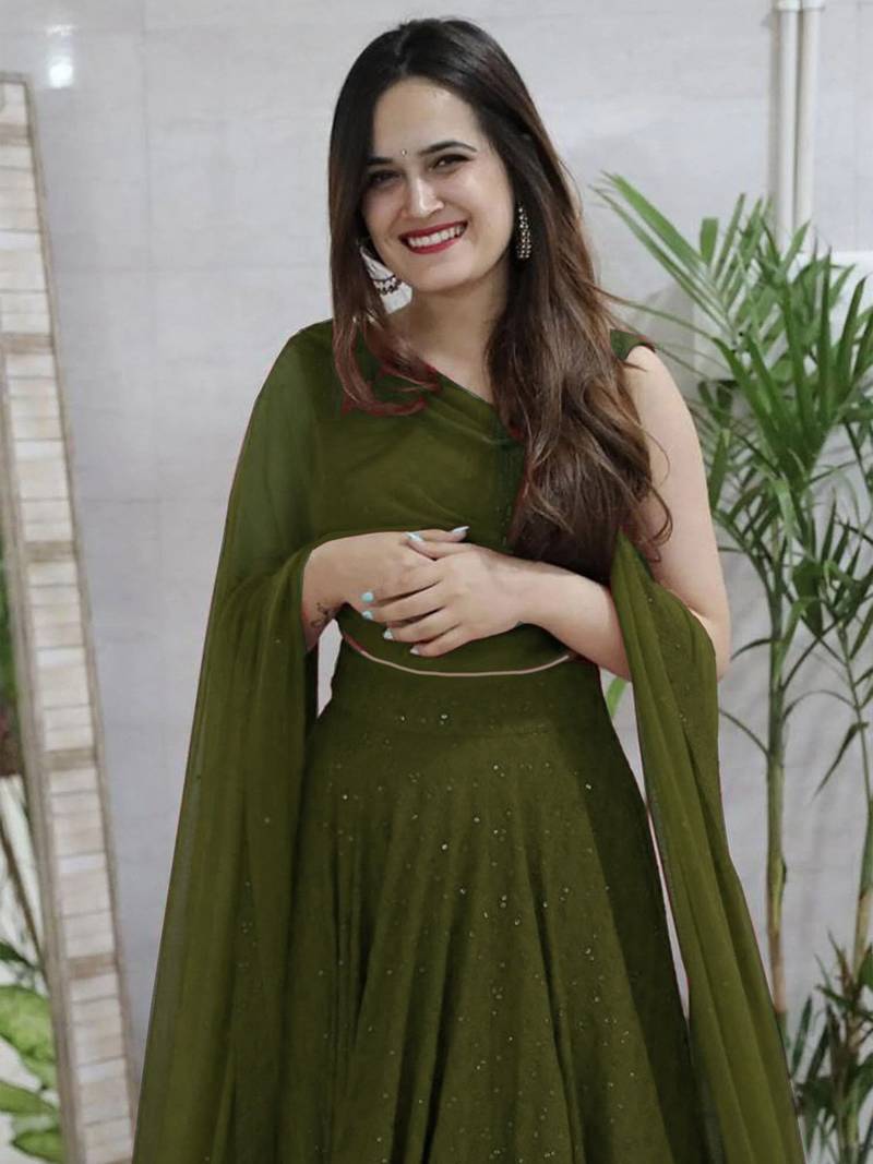 fabulous Mahendi Green sequins and thread embroidered georgette reception indian wedding mahendi lehenga choli dress