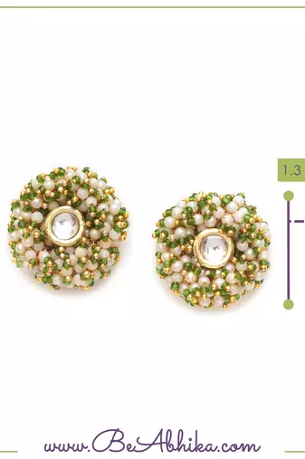 Gold tone green & white garden of pearl kundan earrings