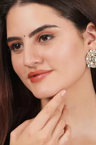 Golden tone kundan & white pearls studs