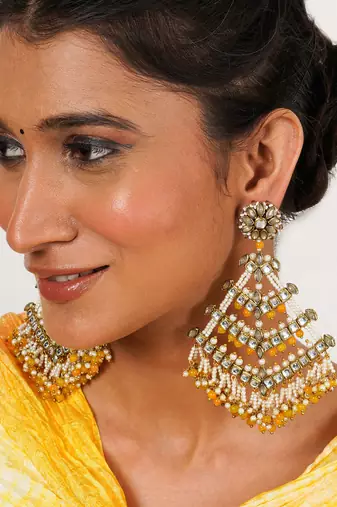 Traditional kundan dangler earrings with yellow beads & white pearls