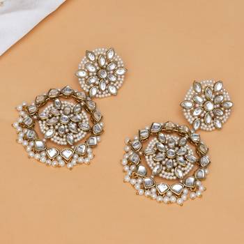 Handcrafted kundan flower stud earrings with pearl fringe 1
