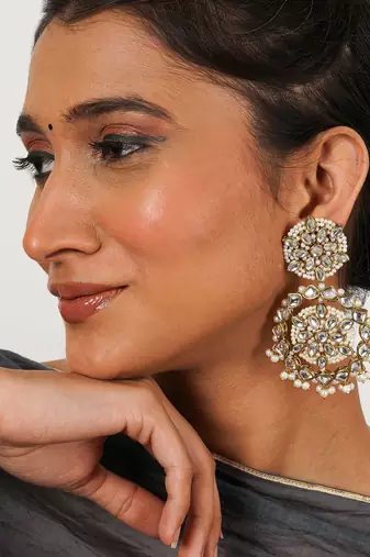 Handcrafted kundan flower stud earrings with pearl fringe