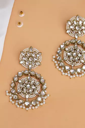 Handcrafted kundan flower stud earrings with pearl fringe