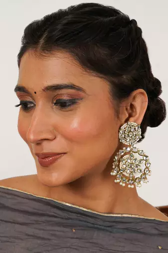 Handcrafted kundan flower stud earrings with pearl fringe