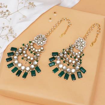 Traditional kundan chandelier earrings with green stones 1