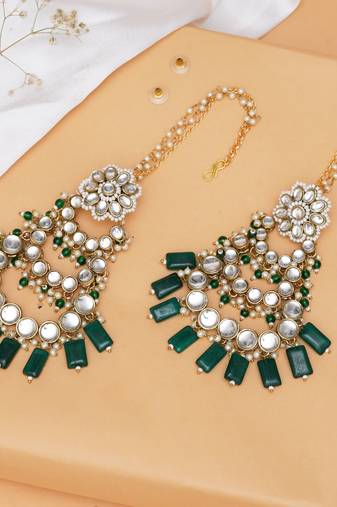 Traditional kundan chandelier earrings with green stones