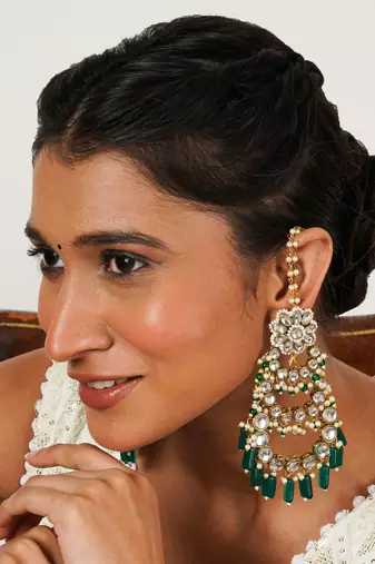 Traditional kundan chandelier earrings with green stones