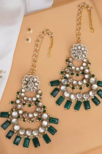 Traditional kundan chandelier earrings with green stones