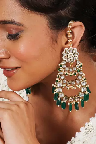 Traditional kundan chandelier earrings with green stones