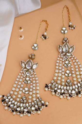 Floral kundan chandbali with pearl drapes earrings