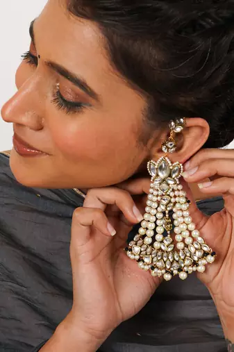 Floral kundan chandbali with pearl drapes earrings