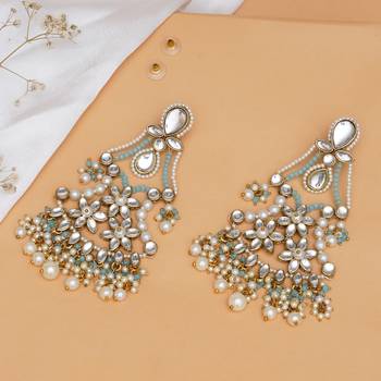 Pastel kundan earrings with floral design and pearl fringe 3
