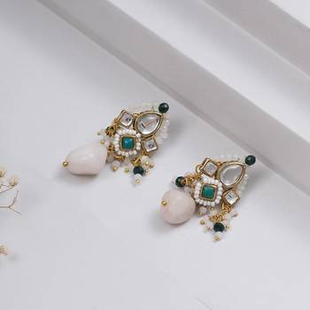 Dark green affair kundan earrings 1