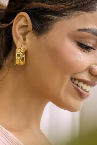 Embellished emerald hoops with yellow gold plating