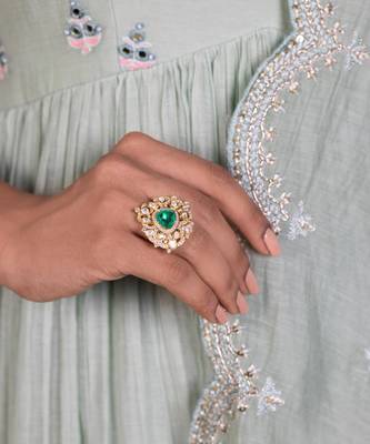 Yellow gold plated ring with green stone 1
