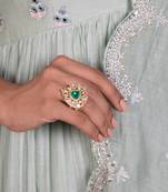 Yellow gold plated ring with green stone