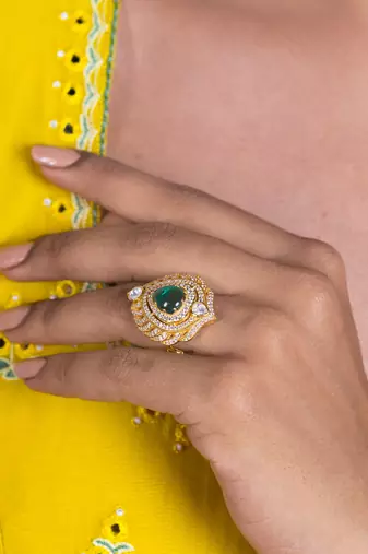 Yellow gold plated silver sterling ring with green stone