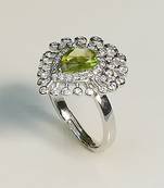 Green jewellery ring with sterling silver base
