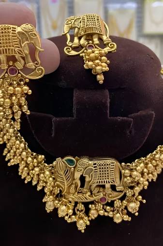 Traditional gold-plated elephant choker & earrings set - handcrafted pearl temple jewelry