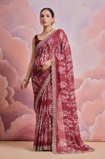 Red printed georgette saree with embroidered lace