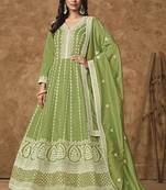 Light green dola silk embroidered anarkali suit