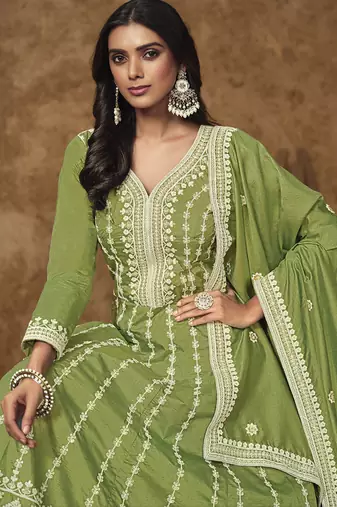 Light green dola silk embroidered anarkali suit