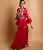 Crimson designer saree with jacket style ready blouse.