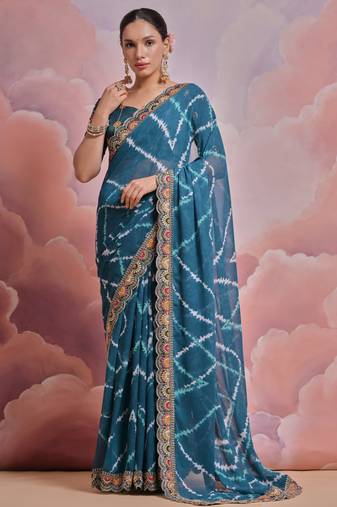 Blue tie and dye printed georgette saree with embroidered border