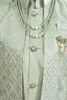 Green geometric embroidered sequined sherwani with pant & necklace set for boys 5