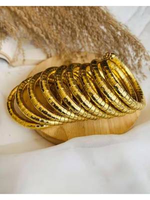   handmade gold plated spiral bangle 1