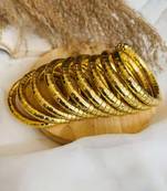   handmade gold plated spiral bangle