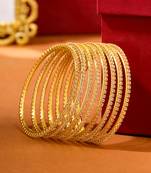 women set of 8 american diamond gold plated bangles