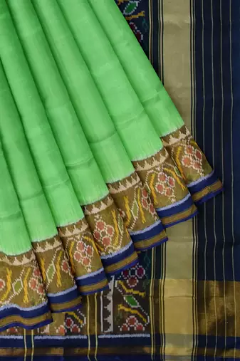 Parrot green and blue patola silk single ikkat silk saree