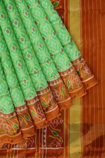 Parrot green and orange patola silk single ikkat silk saree