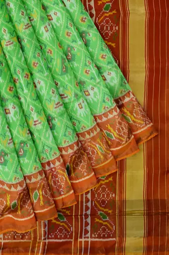 Parrot green and orange patola silk single ikkat silk saree