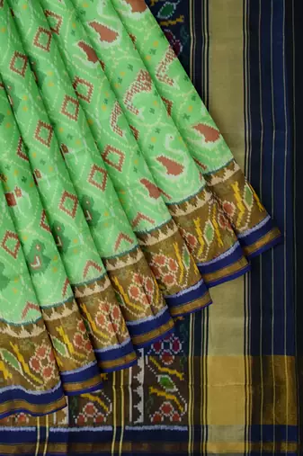 Parott green and blue patola silk single ikkat silk saree