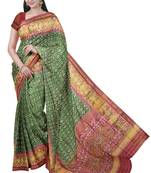 Red and green patola silk single ikkat silk saree