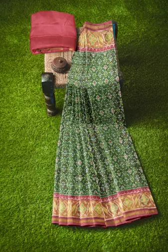 Red and green patola silk single ikkat silk saree