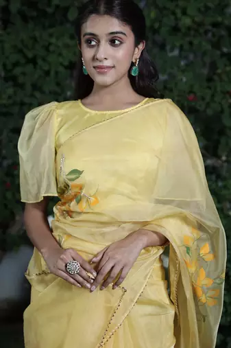 Yellow organza hand printed saree