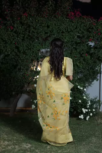 Yellow organza hand printed saree