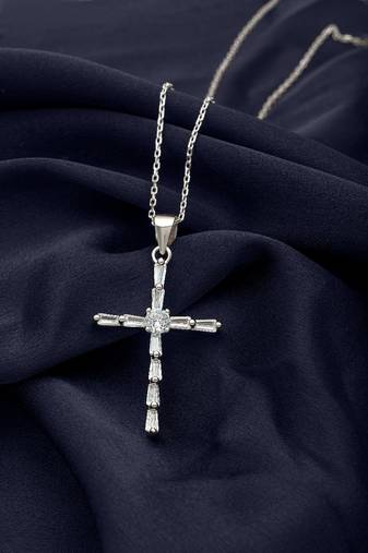 layered cross pendant