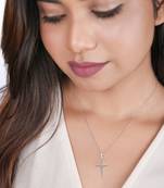 layered cross pendant