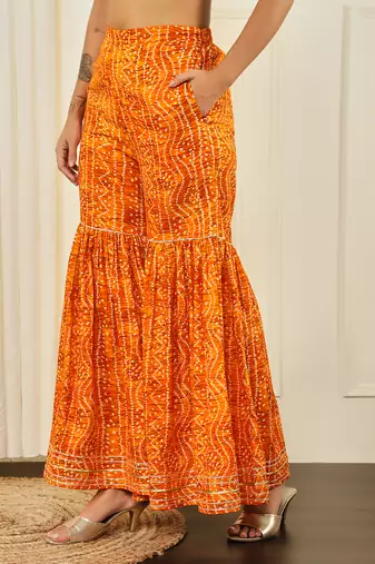 Yellow front slit flared kurta with sharara