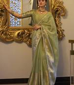 pista green zari weaving tissue silk saree with blouse