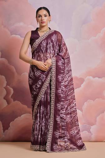 Wine printed georgette saree with embroidered lace