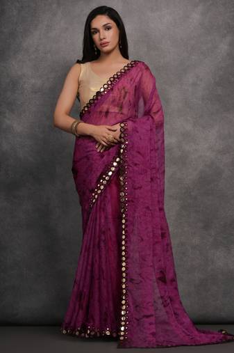 Purple printed georgette saree with mirror work border