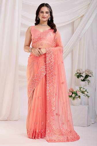 Fetching coral pink sequins embroidered gold twill net indian designer latest designers party saree